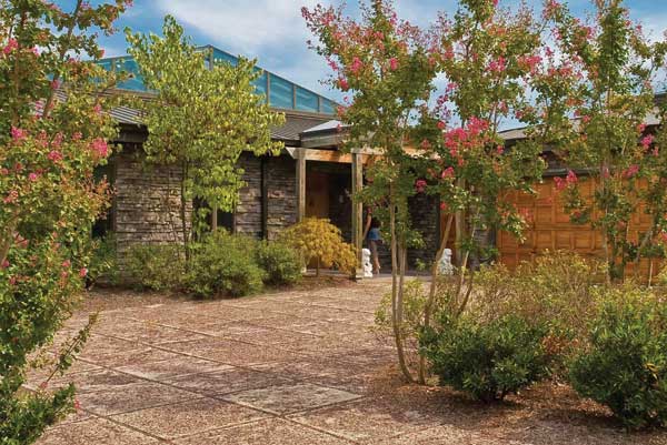 The homes' exteriors are beautifully landscaped.